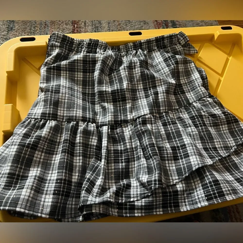 Kidpik Plaid Skirt with attached shorts and bow detail; zipper closure
